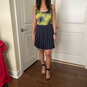 Green floral dress with navy pleated skirt